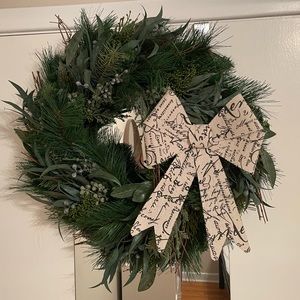 Beautiful custom festive wreath with modern print bow. Full and lush!